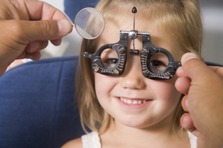 Children's eye tests are simple and painless Image of child have their eyes tested