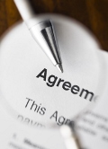 Magnifying_glass_reading_agreement_edited.jpg